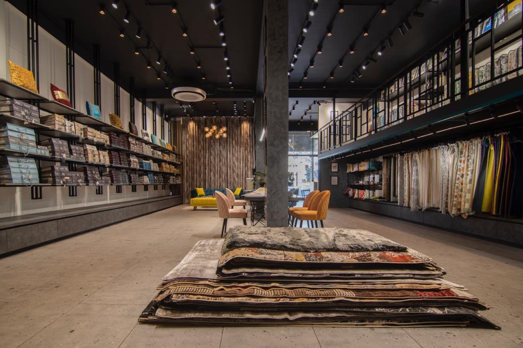 Fabric sample library along the showroom aisle